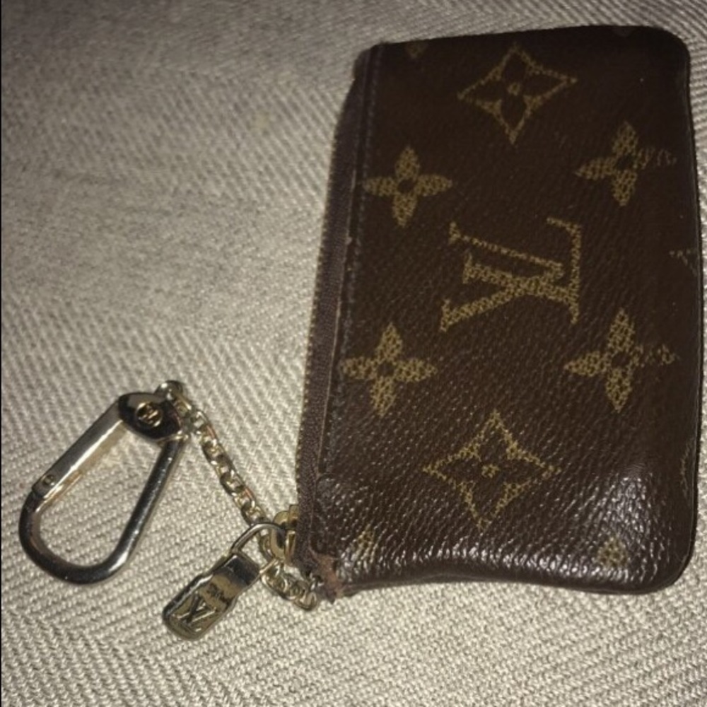 Louie Vuitton key chain and cold holder